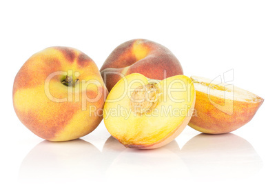 Fresh Raw yellow peach isolated on white Fresh Raw yellow peach isolated on white