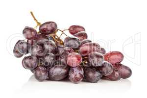 Raw fresh red globe grape isolated on white