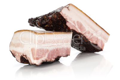 Fresh smoked english bacon isolated on white