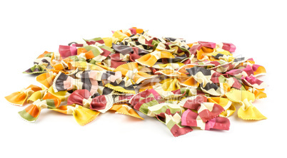 Colourful raw farfalle isolated on white