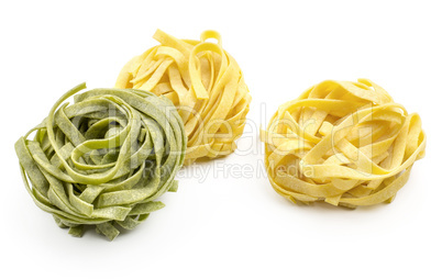 Raw fresh Fettuccine isolated on white