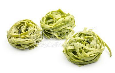 Raw fresh Fettuccine isolated on white