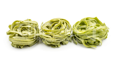 Raw fresh Fettuccine isolated on white