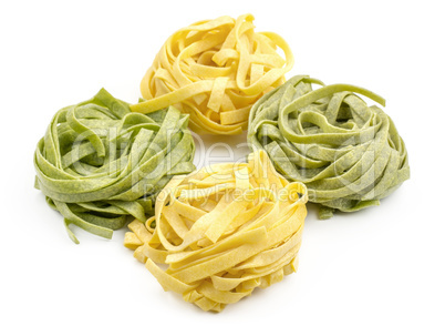 Raw fresh Fettuccine isolated on white