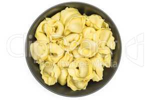 Fresh Raw tortellini pasta isolated on white
