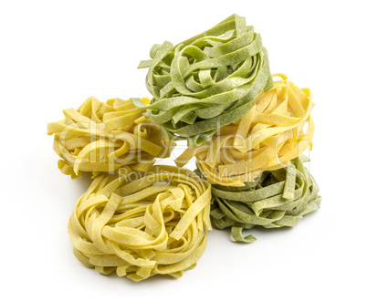 Raw fresh Fettuccine isolated on white