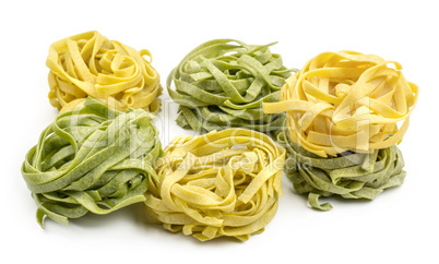 Raw fresh Fettuccine isolated on white