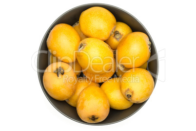 Fresh raw orange japanese loquat isolated on white