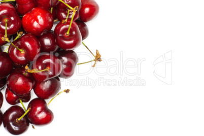 Fresh raw sweet red cherry isolated on white