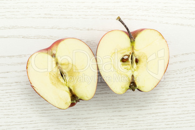 Fresh raw apple red delicious on grey wood