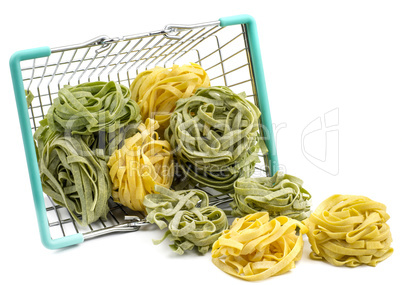 Raw fresh Fettuccine isolated on white