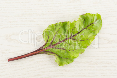 Fresh raw red beetroot on grey wood