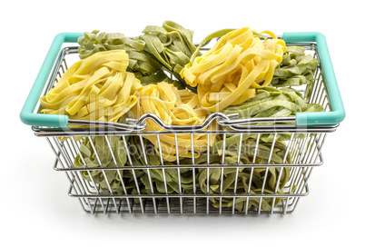 Raw fresh Fettuccine isolated on white