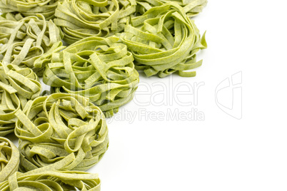 Raw fresh Fettuccine isolated on white