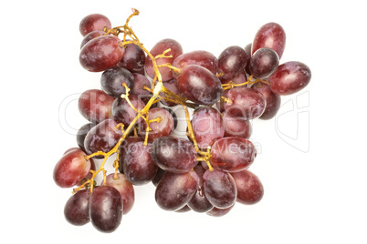 Raw fresh red globe grape isolated on white