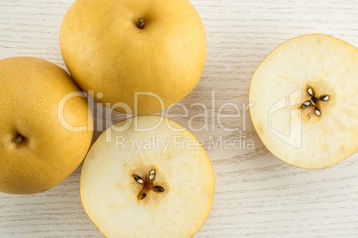 Fresh Nashi golden pear isolated on white