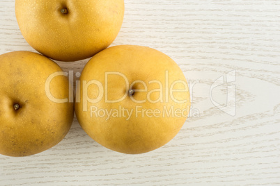 Fresh Nashi golden pear isolated on white