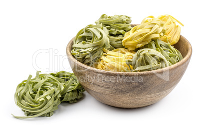 Raw fresh Fettuccine isolated on white