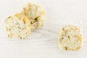 Fresh boiled Carlsbad bread dumpling on grey wood