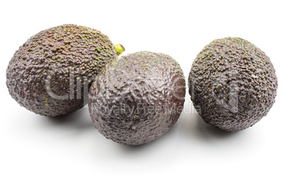 Fresh purple avocado isolated on white