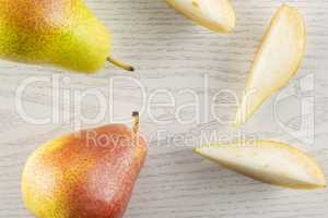 Fresh Raw red pear on grey wood