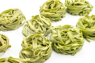 Raw fresh Fettuccine isolated on white