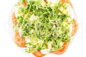 Fresh caprese salad isolated on white