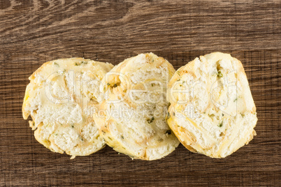 Fresh boiled Carlsbad bread dumpling on brown wood