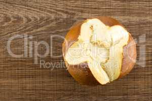 Fresh Bavarian bread bun on brown wood