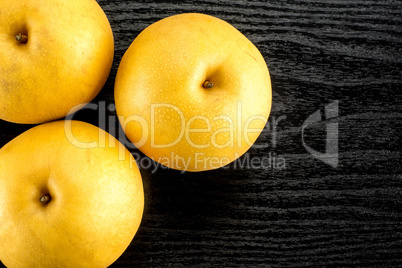 Fresh Nashi golden pear isolated on white