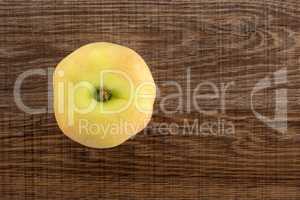 Fresh raw saturn peach on brown wood