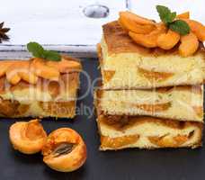 baked pieces of biscuit pie with apricots