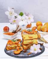 pile of square pieces of a biscuit pie with apricots