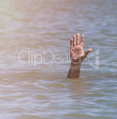 gesture for the help of a drowning man