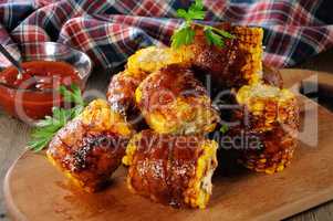Grilled corn wrapped in bacon