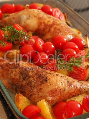 Roasted chicken legs with potatoes