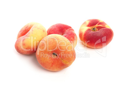 Tasty organic doughnut peaches on white