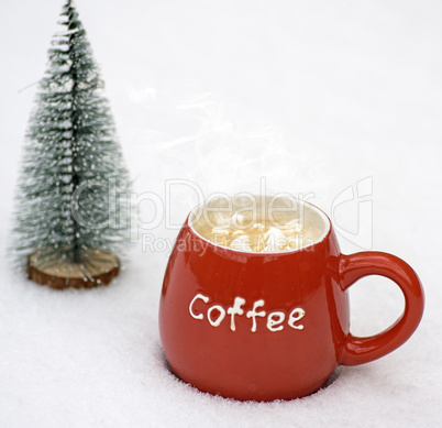 red ceramic mug with hot coffee and marshmallow