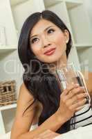 Beautiful Chinese Asian Woman Drinking Glass of Water