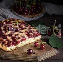 piece of a biscuit pie with cherries