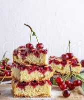 square biscuit slices of a pie with cherries