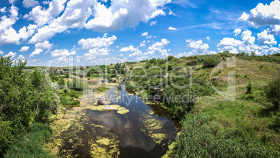 River in Aktovsky canyon, Ukraine. Big rocks in small river and