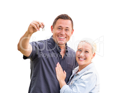 Young Adult Couple Holding New House Keys Isolated On A White Ba