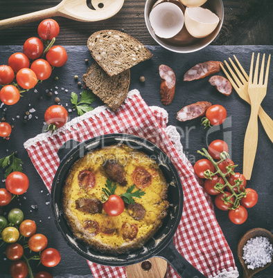 fried omelette, whipped eggs with cherry tomatoes