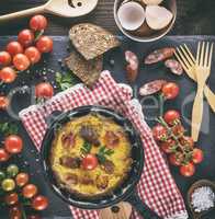 fried omelette, whipped eggs with cherry tomatoes