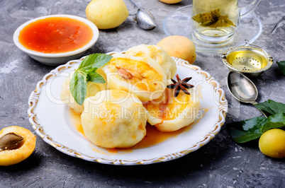 Dumplings with apricot and spicy syrup