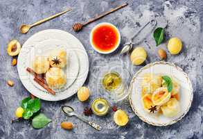 Dumplings with apricot and syrup