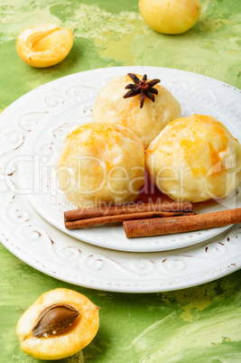 Dumplings with apricot and syrup
