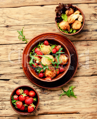 Salad with strawberry and fried cheese