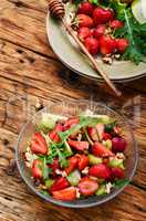 bowl of salad with strawberry